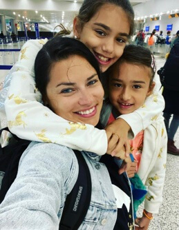 Sienna Lima Jaric with her mother Adriana Lima and sister Valentina Lima Jaric